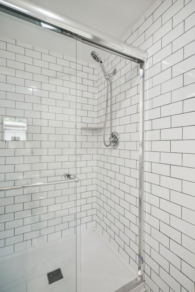 bathroom with an enclosed shower