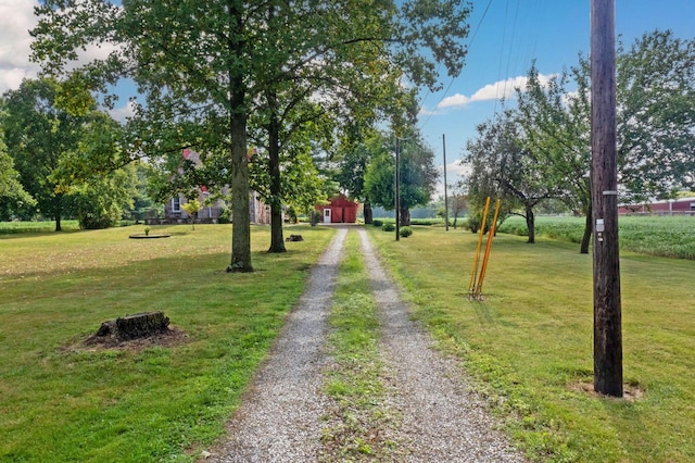 view of home's community featuring a lawn