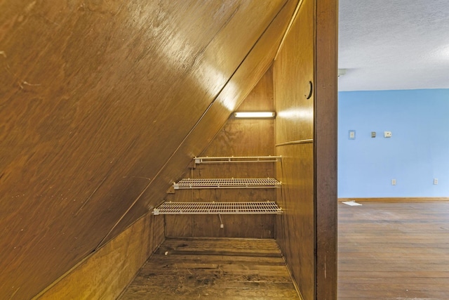 interior space featuring hardwood / wood-style floors and a textured ceiling