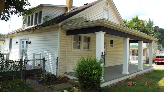 view of home's exterior with a porch