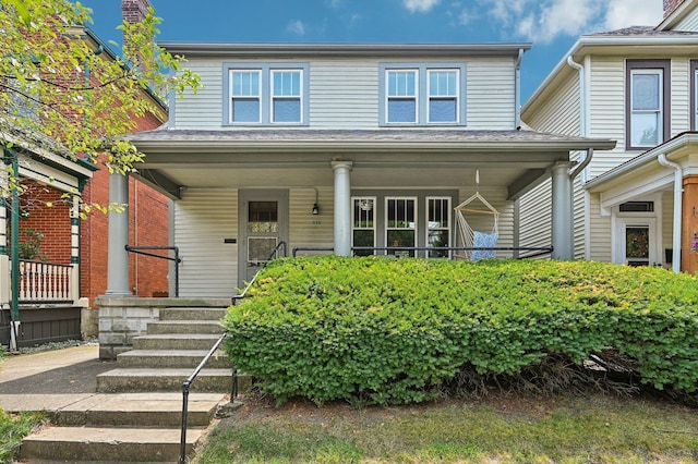 view of front of property featuring covered porch