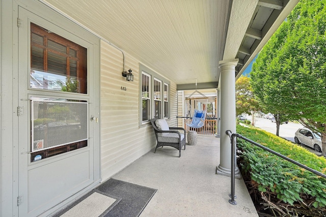 view of patio featuring a porch