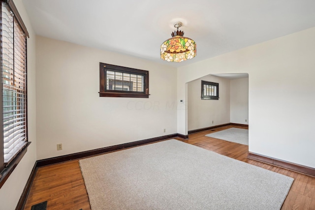 spare room featuring hardwood / wood-style floors