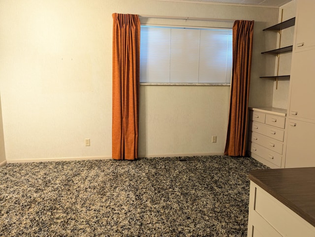 unfurnished bedroom featuring carpet floors