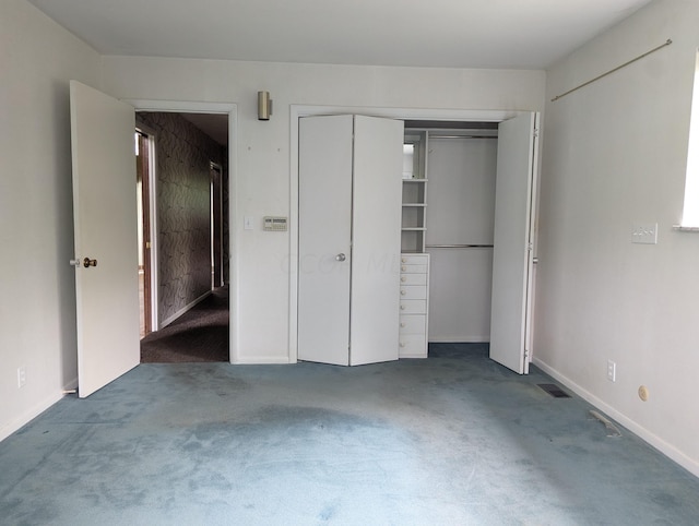 unfurnished bedroom featuring carpet floors