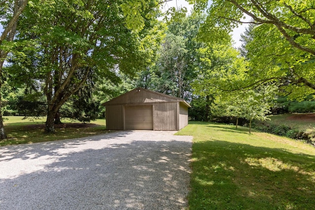 garage with a lawn