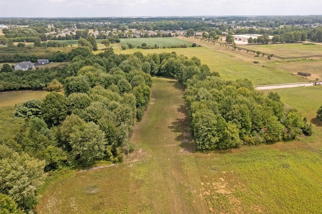 birds eye view of property featuring a rural view