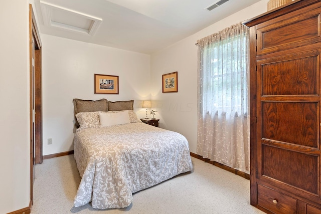 bedroom with light carpet