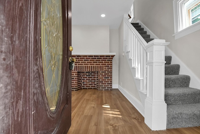 stairway with wood-type flooring