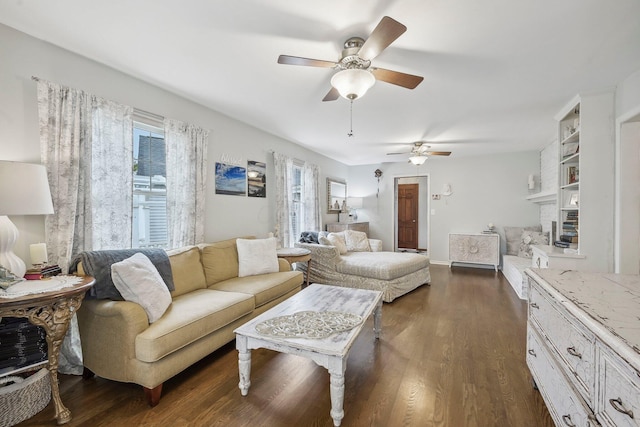 living room with dark hardwood / wood-style floors and ceiling fan