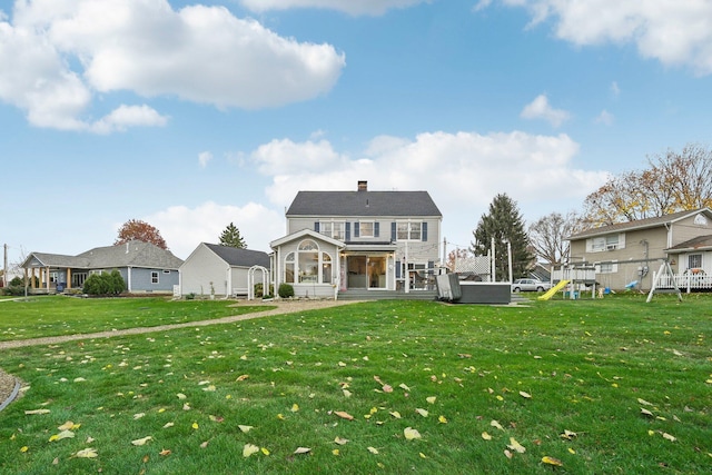 view of front facade with a front lawn