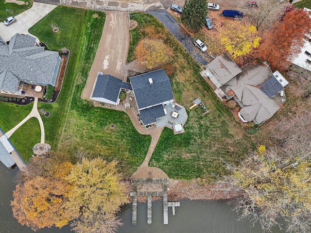 birds eye view of property featuring a water view