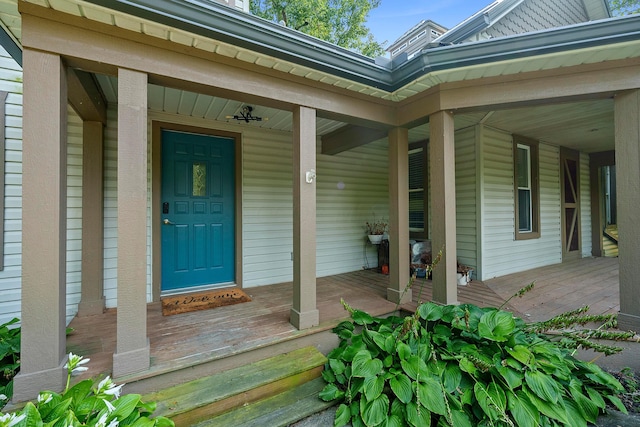 doorway to property with a porch