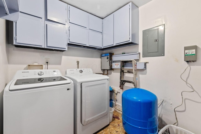 13207 Clapper Hollow Rd, Rockbridge, OH 43149 - laundry area featuring electric panel, cabinet space, and separate washer and dryer