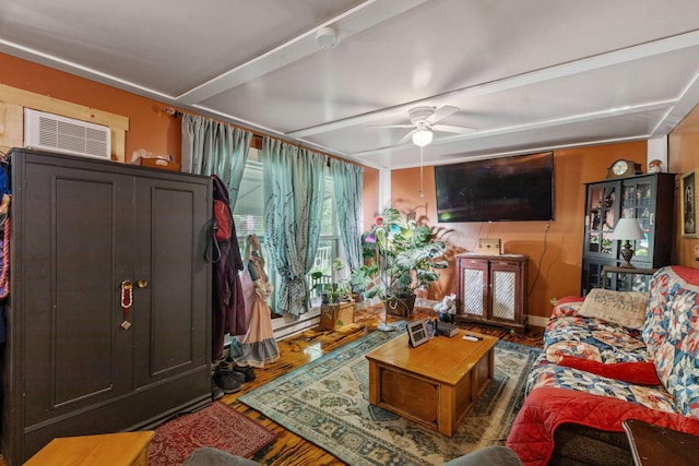 living room with hardwood / wood-style floors and ceiling fan