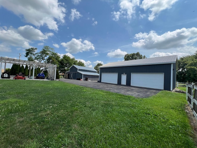 garage with a yard