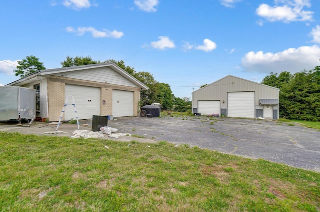 garage with a yard