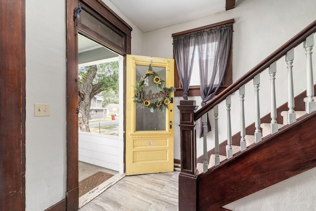 foyer entrance with light hardwood / wood-style flooring