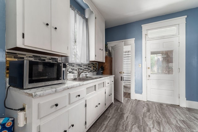 kitchen with white cabinets and sink