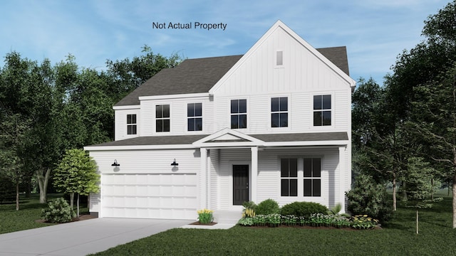 modern farmhouse featuring a front lawn and a garage