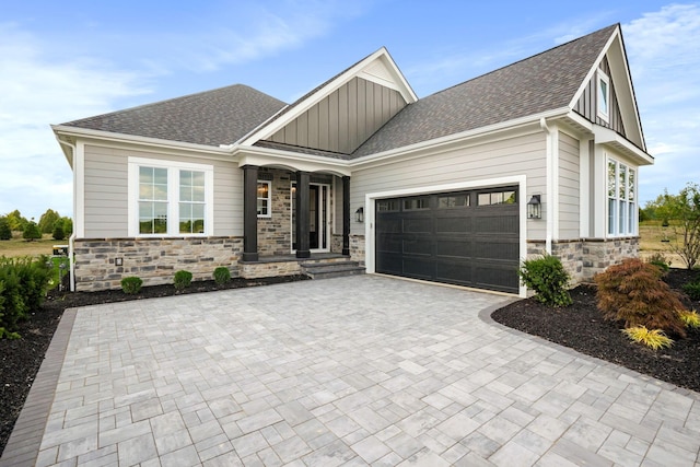 craftsman-style home with a garage