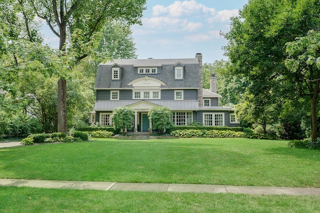 view of front of home featuring a front lawn