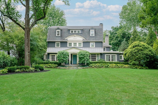 view of front of home with a front yard