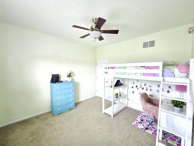 bedroom with ceiling fan and light colored carpet