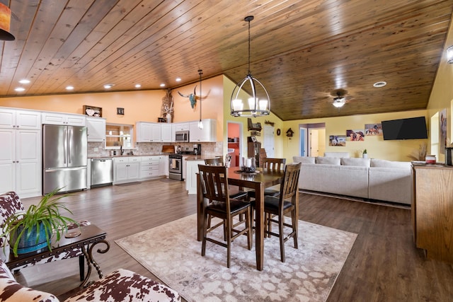 dining space featuring dark wood-style floors, recessed lighting, wood ceiling, and vaulted ceiling