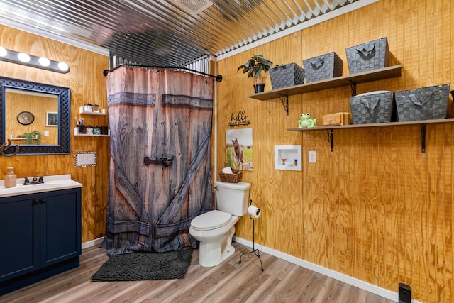 full bath featuring wood ceiling, vanity, toilet, and wood finished floors