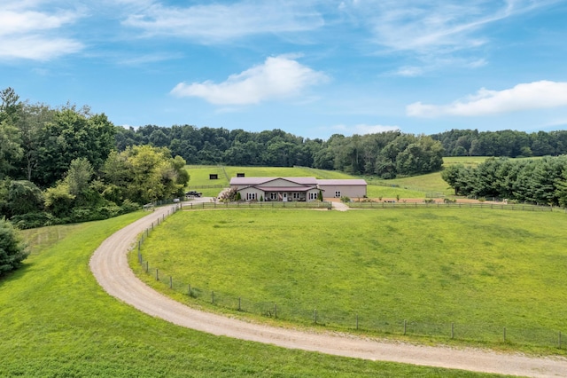 birds eye view of property with a rural view