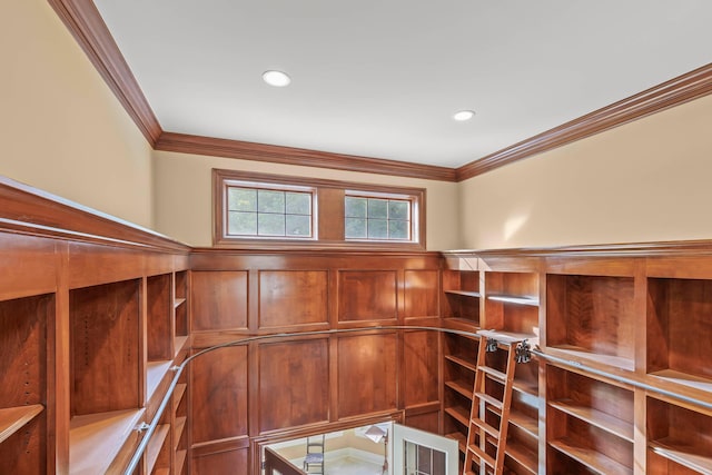 interior space with crown molding