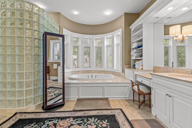 bathroom featuring tile patterned flooring and vanity