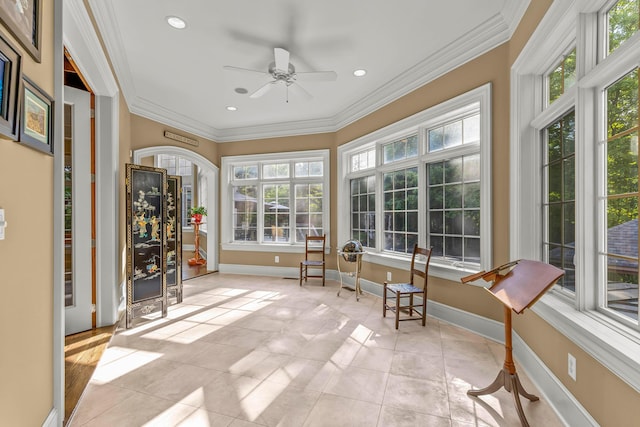 sunroom / solarium with ceiling fan