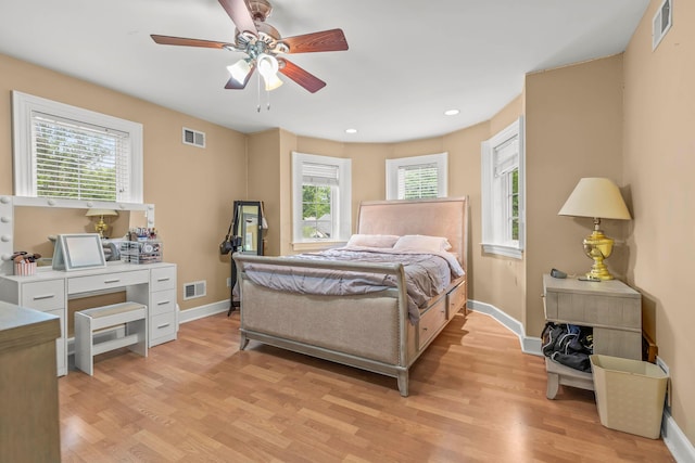 bedroom featuring ceiling fan and light hardwood / wood-style floors