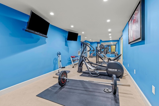 workout room featuring carpet floors