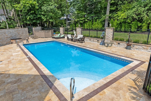 view of pool with a patio area