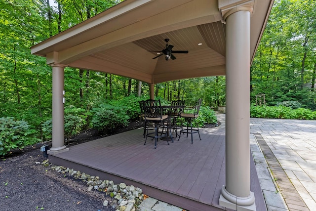 deck featuring a gazebo and ceiling fan