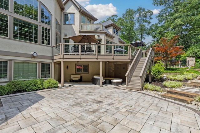 back of property featuring a patio