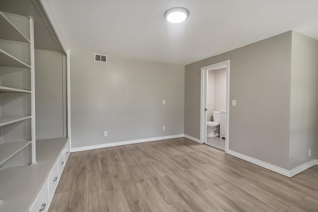 empty room featuring light hardwood / wood-style floors