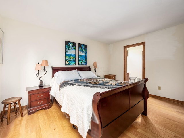 bedroom with light wood-type flooring