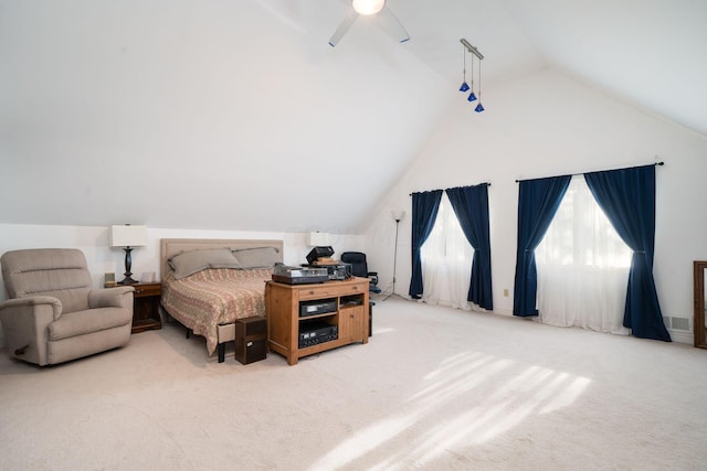 carpeted bedroom featuring ceiling fan and lofted ceiling