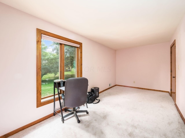 view of carpeted home office