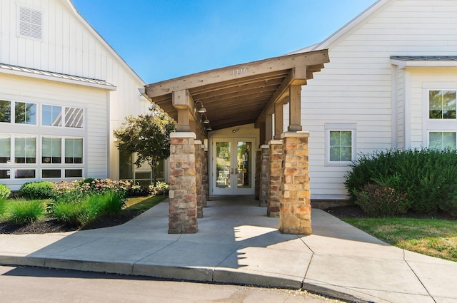 doorway to property featuring french doors