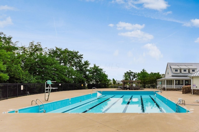 view of pool with a patio