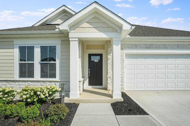 property entrance with a garage