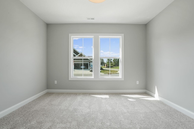 view of carpeted spare room