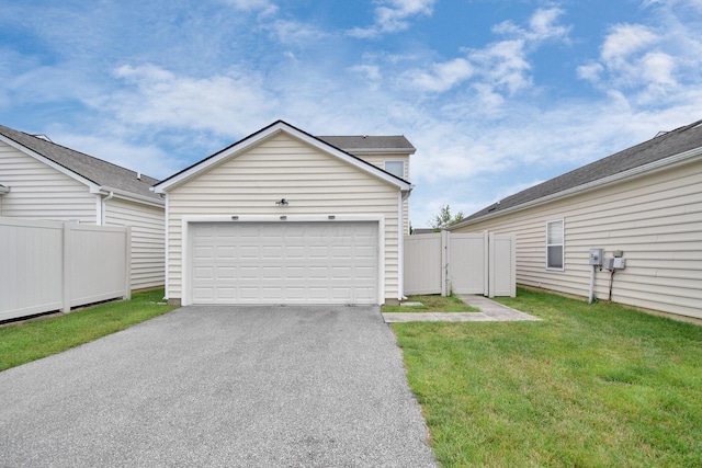 garage with a lawn