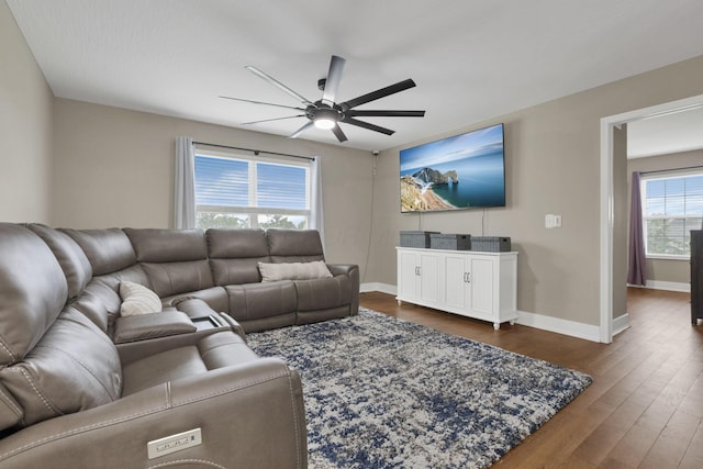 667 Green Forest Pl, Lithopolis, OH 43136 - living area with ceiling fan, dark wood-type flooring, and baseboards