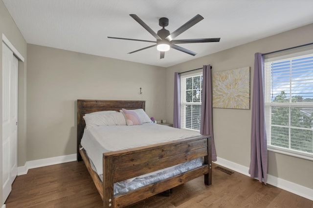 667 Green Forest Pl, Lithopolis, OH 43136 - bedroom with wood finished floors, baseboards, ceiling fan, and a closet